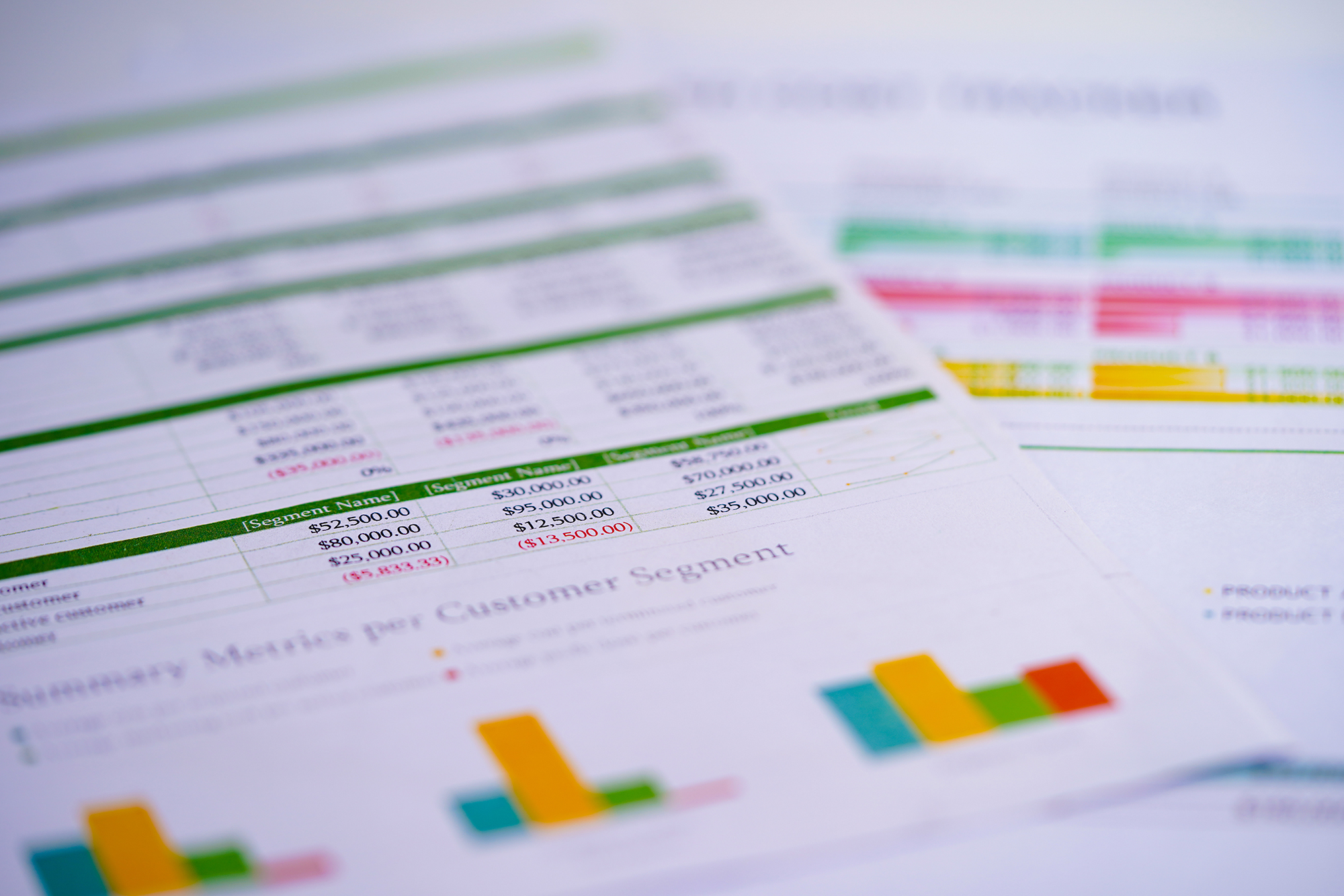 close up of papers with financial information on them
